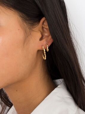 BRAND NEW 18k gold plated over silver. nugget loop earrings.